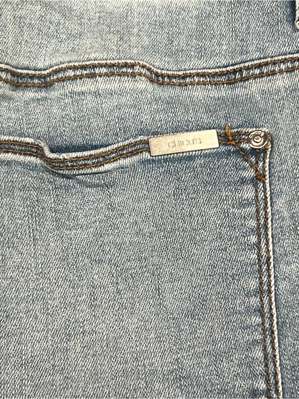 Chicos Light wash distressed jeans with rhinestones and studs size 1R